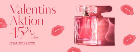 Werbung mit rosa Hintergrund und einer Parfümflasche aus Glas. Der Text lautet „Valentins-Aktion -15 % auf Düfte Jetzt entdecken“ mit roten Lippenstift-Kussspuren rund um das Bild.