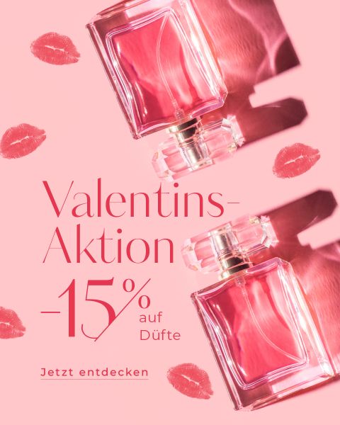 Werbebild zum Valentinstag, das zwei rosa Parfümflaschen vor einem rosa Hintergrund mit Kussspuren aus rotem Lippenstift zeigt. Text lautet: „Valentins-Aktion -15 % auf Düfte. Jetzt entdecken.“.